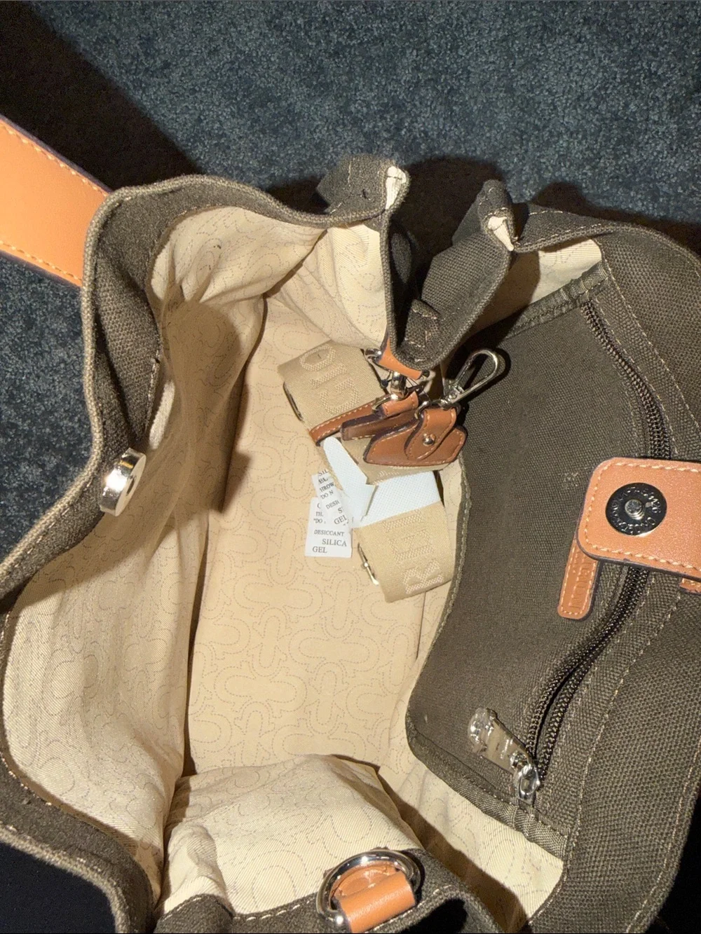 True Religion Brown Canvas Tote with Tan Leather Handles and Red Logo Patch